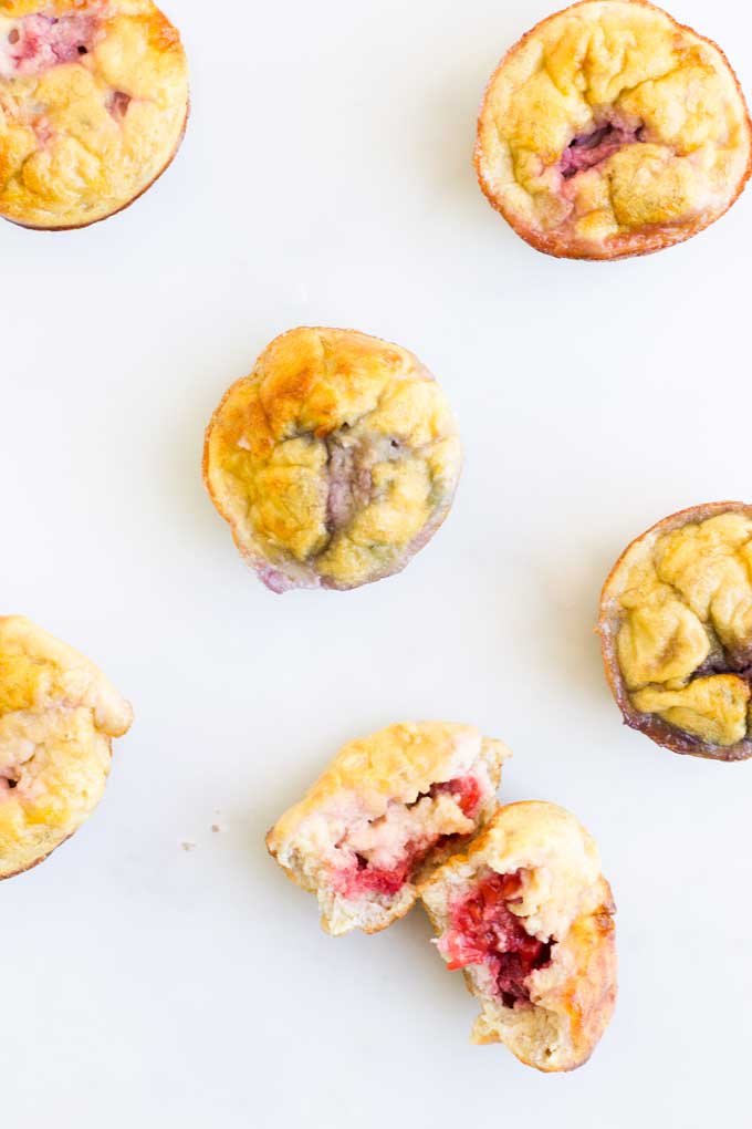 Top Down View of Fruity Egg Muffins. One Split Open to See Inside