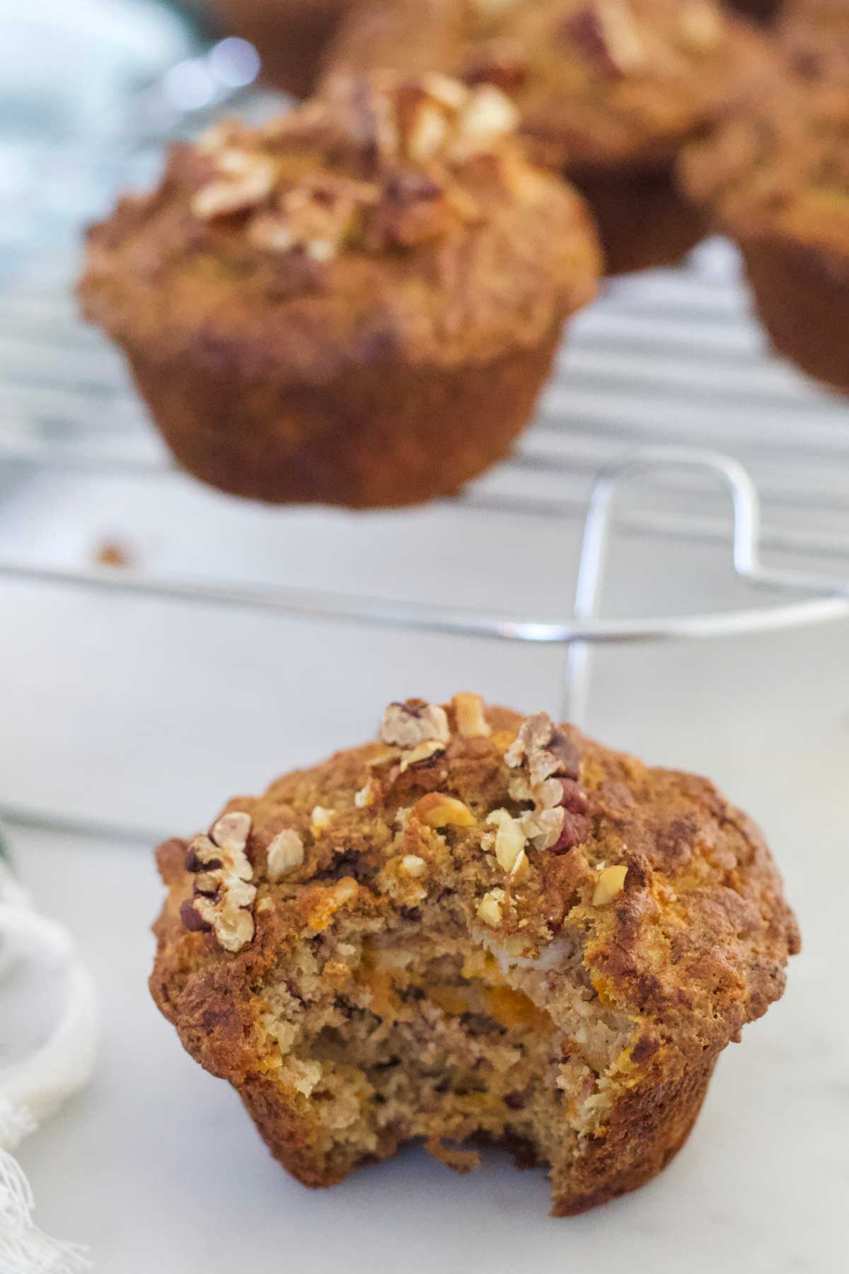 Close Up Shot of Carrot Muffin with Bite Taken Out
