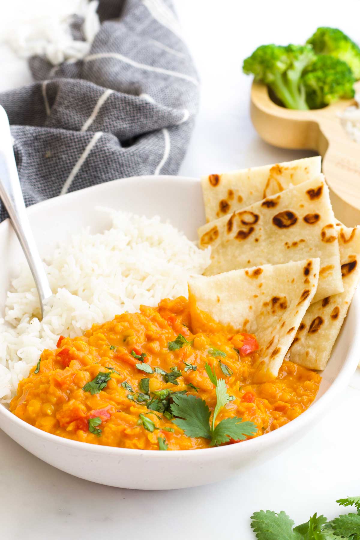 Lentil Curry in Bowl with Rice and Roti Bread