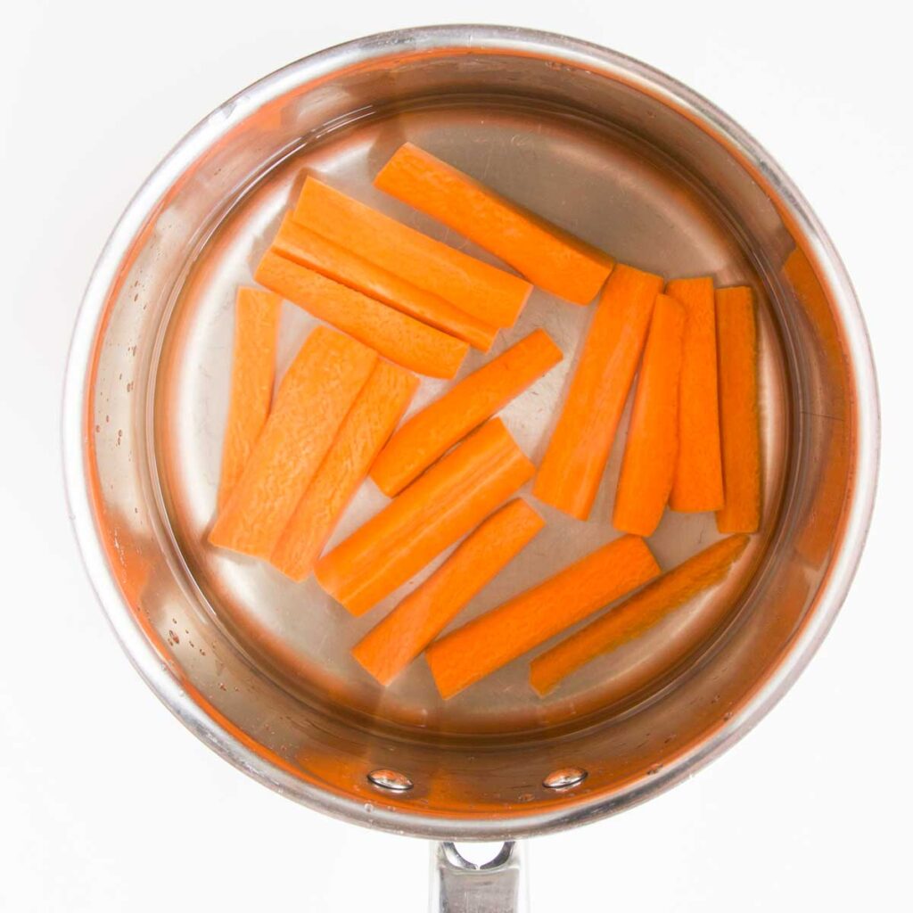 Carrot Sticks in Pan with Water