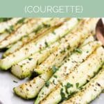 Baked Zucchini on Side Plate with Text Overlay "How to Make. Baked Zucchini (COurgette)"