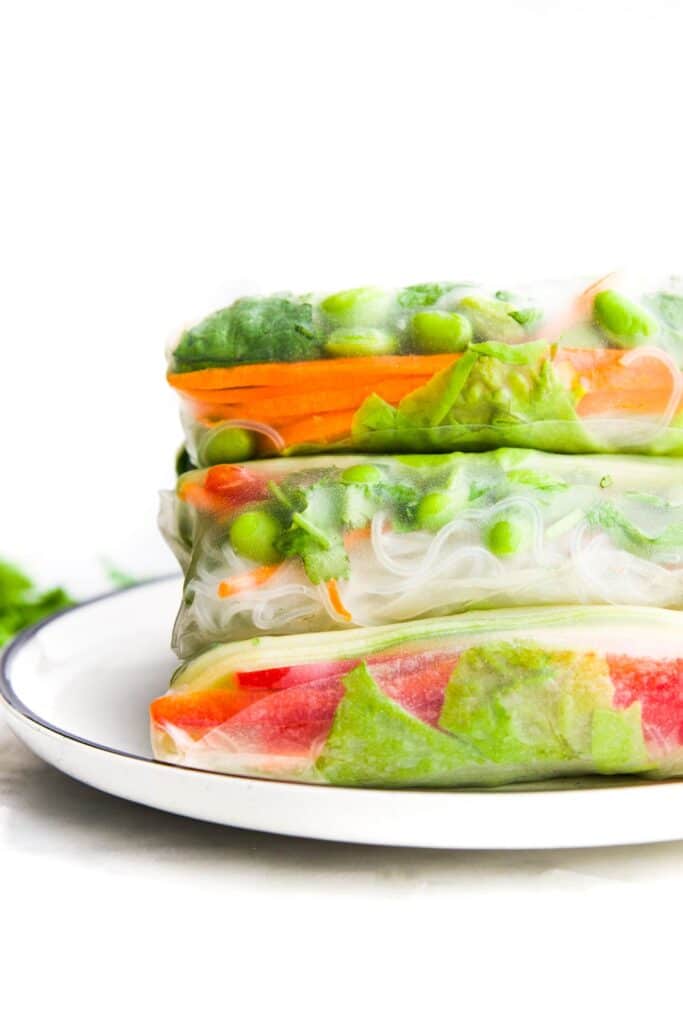 Side Shot of Vegetable Rice Paper Rolls Stacked in a Triangle