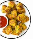 Veggie Tots on Plate with Small Bowl of Ketchup.