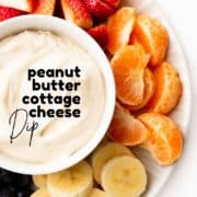 Pinterest Pin for Peanut Butter Cottage Cheese Showing Image of Peanut Butter Cottage Cheese in Bowl with Cut Fruit.